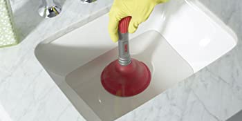 sink and drain plunger in use