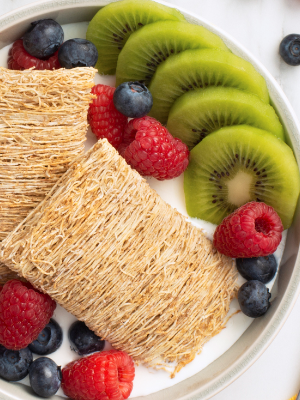 Bowl of shredded wheat with fruit