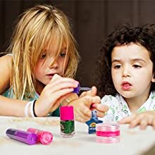 little girl play nail polish