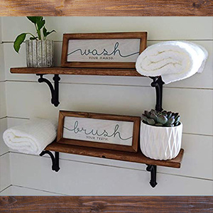 Use old barn wood to top these iron brackets for a classic cabin feel