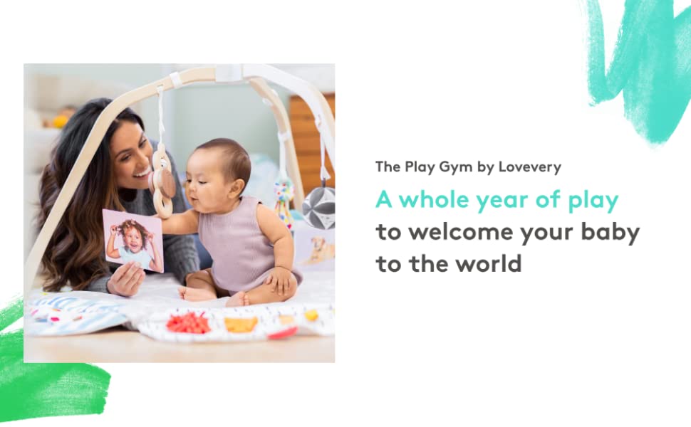 Parent and child playing on the Lovevery Play Gym