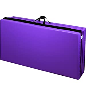 PRISP purple gymnastics mat, folded, standing on its edge with handles on top. on white background