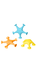 Ubbi blue, orange and yellow starfish bath toys arranged in triangular formation